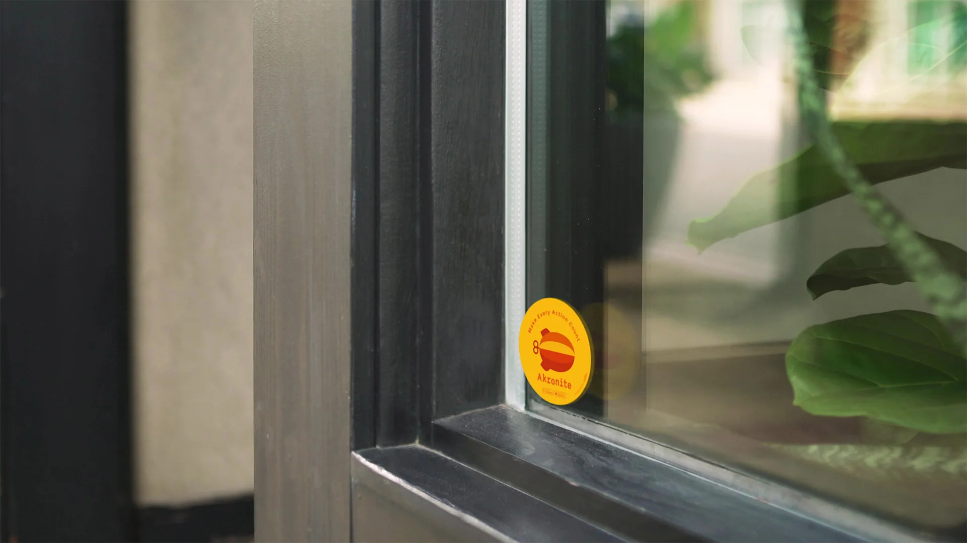 Akronite App, close up of Akronite App sticker in corner of storefront window