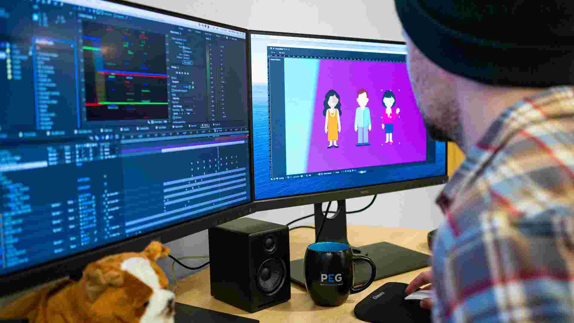 Over-the-shoulder view of Adobe After Effects open on computer screen