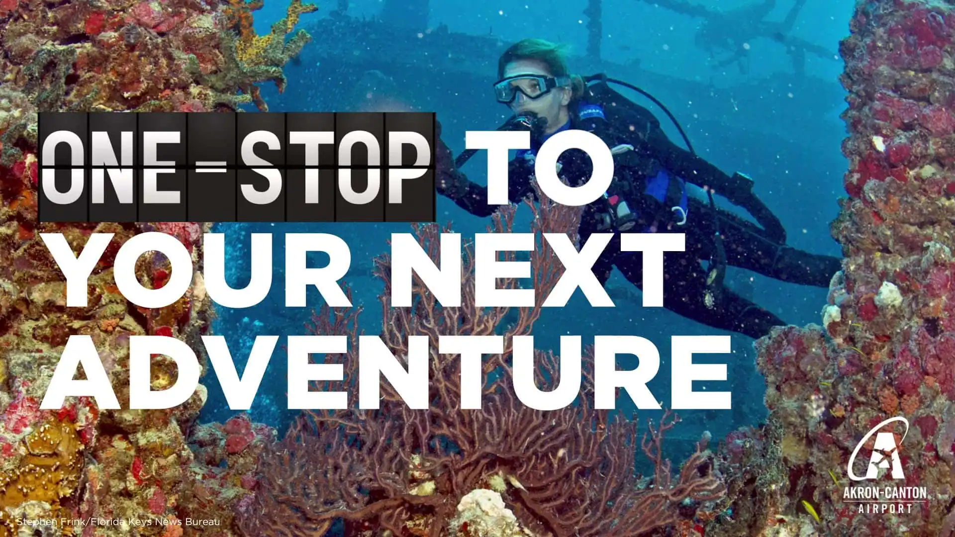 Akron-Canton Airport, underwater scene of scuba diver in coral reef, text overlay saying One-Stop To Your Next Adventure